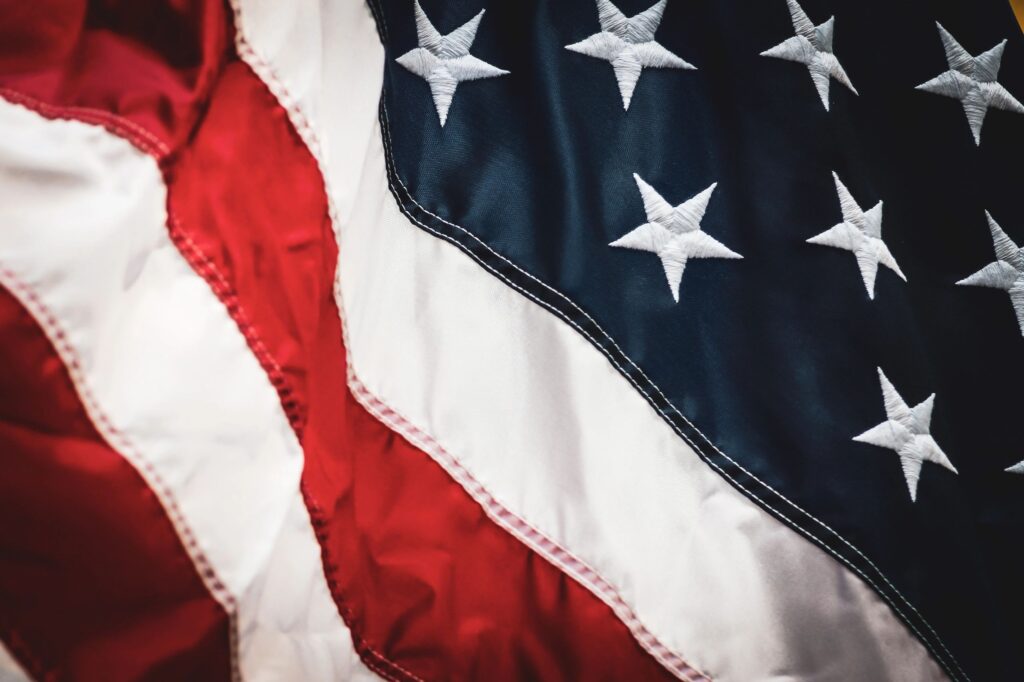 a classic american flag fabric pattern with vintage detail. background or design element.