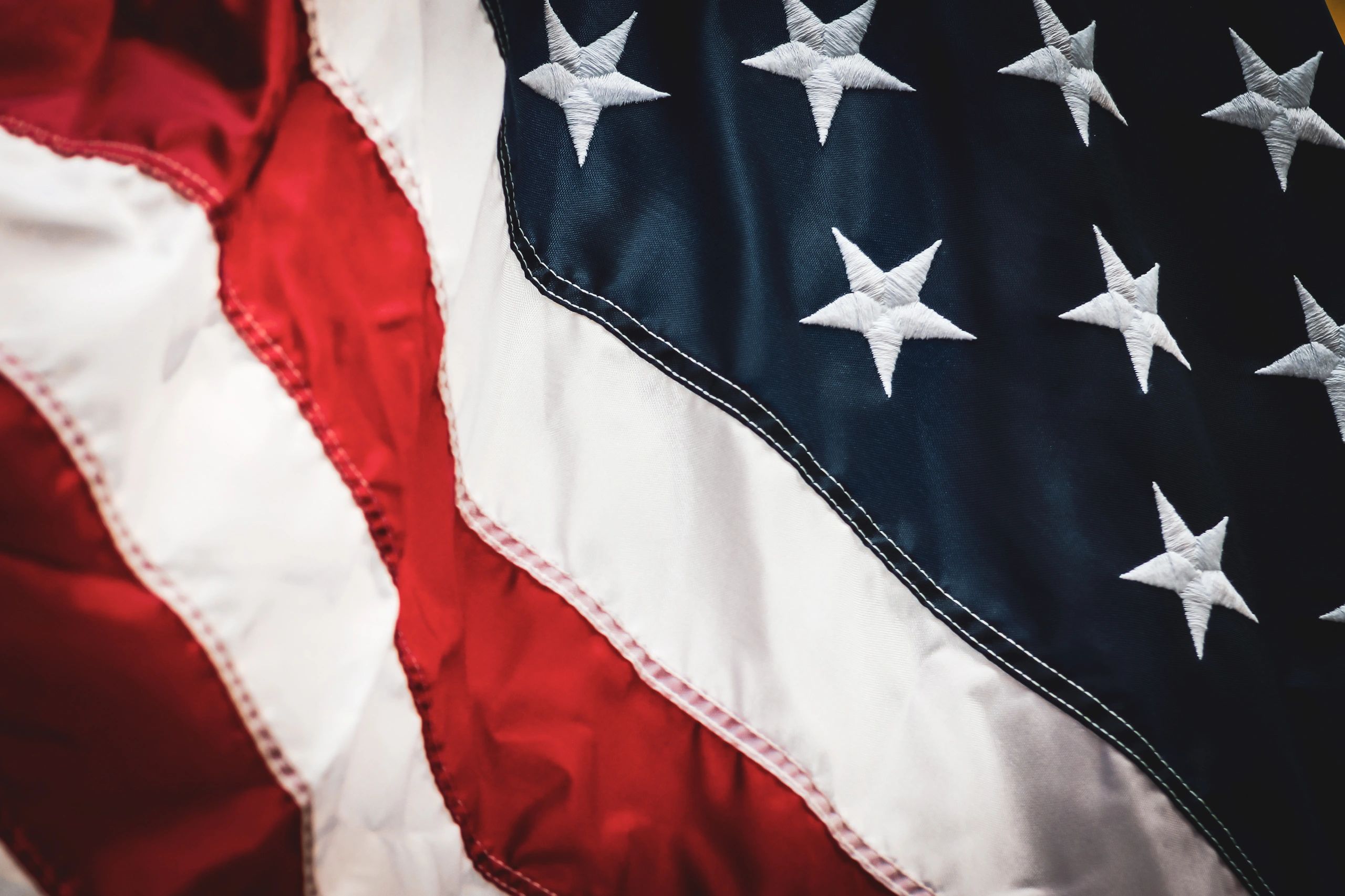 a classic american flag fabric pattern with vintage detail. background or design element.